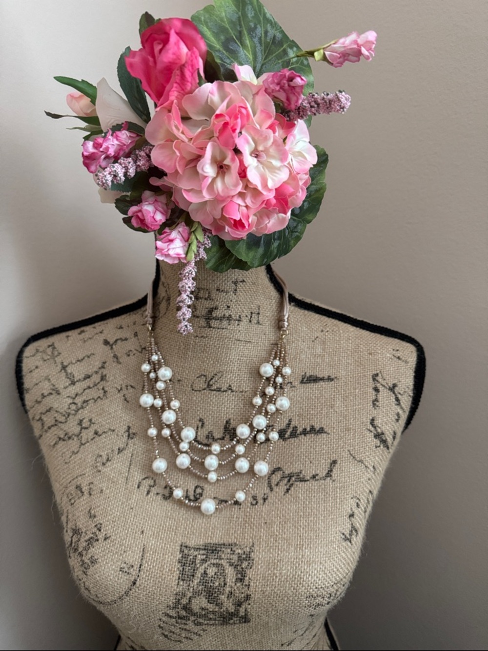 Four strand pearl and crystal necklace.